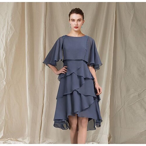 A-Line Mother of the Bride Dress Elegant Jewel Neck Asymmetrical Knee Length Chiffon Short Sleeve with Ruffles 2022
A-Line Mother of the Bride Dress Elegant Jewel Neck Asymmetrical Knee Length Chiffon Short Sleeve with Ruffles 2022