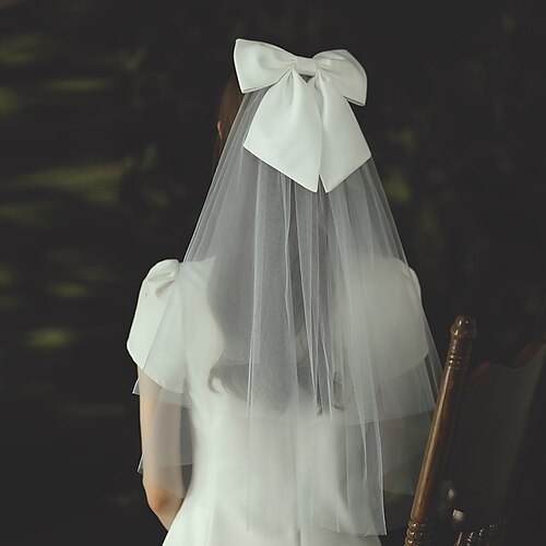 2 strati Moda / stile sveglio Veli da sposa Velo corto (ai gomiti) con Fiocco in satin Tulle
2 strati Moda / stile sveglio Veli da sposa Velo corto (ai gomiti) con Fiocco in satin Tulle