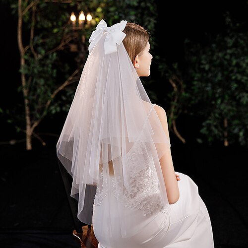 Three-tier Vintage Inspired / Sweet Wedding Veil Elbow Veils with Faux Pearl / Satin Bow / Appliques Tulle
Three-tier Vintage Inspired / Sweet Wedding Veil Elbow Veils with Faux Pearl / Satin Bow / Appliques Tulle