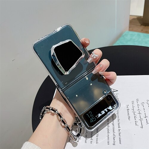 telefon Etui Til Samsung Galaxy Flip Case Z Flip Z Flip 4/3/2 Bærbar Flipp med håndleddsstropp Ensfarget PC
telefon Etui Til Samsung Galaxy Flip Case Z Flip Z Flip 4/3/2 Bærbar Flipp med håndleddsstropp Ensfarget PC
