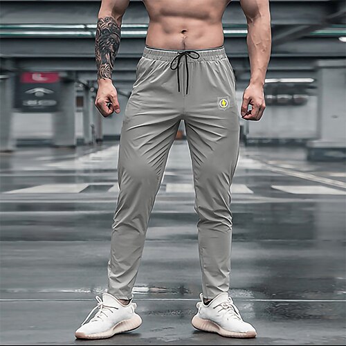 Men's Trousers Casual Pants Drawstring Elastic Waist Print Sports Fitness Running Gym Fashion Casual / Sporty Gray
Men's Trousers Casual Pants Drawstring Elastic Waist Print Sports Fitness Running Gym Fashion Casual / Sporty Gray