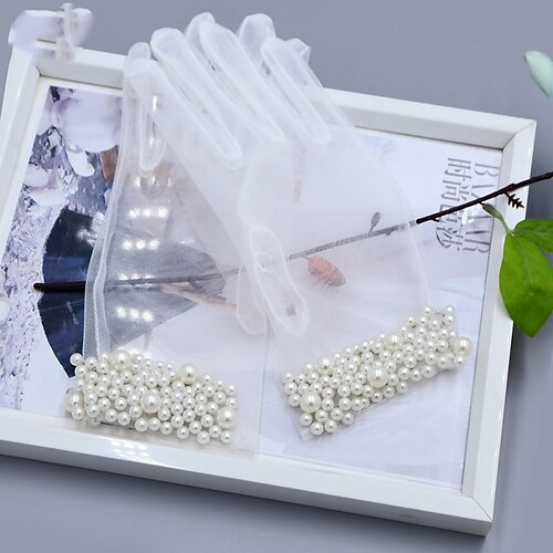 Net Wrist Length Glove Vintage Style / Pearl Trim Edge With Faux Pearl Wedding / Party Glove
Net Wrist Length Glove Vintage Style / Pearl Trim Edge With Faux Pearl Wedding / Party Glove