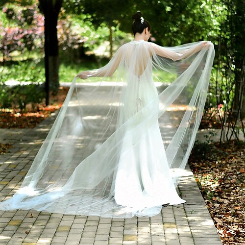 Brudeomslag Kappe Romantikk Brude Ermeløs Tyll Bryllup Wrap Med Rhinsten Til Bryllup Vår sommer
Brudeomslag Kappe Romantikk Brude Ermeløs Tyll Bryllup Wrap Med Rhinsten Til Bryllup Vår sommer