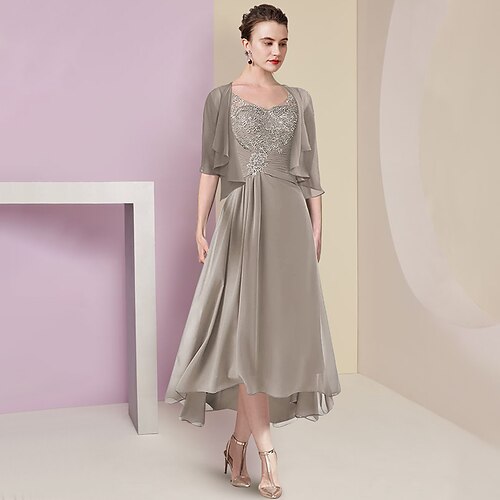 Todelt A-linje Kjole til brudens mor Formel Bryllupsgæst Elegant Assymetrisk længde V-hals Assymetrisk Te-længde Chiffon Blondelukning Halvlange ærmer Indpakning inkluderet med Krøllede Folder
Todelt A-linje Kjole til brudens mor Formel Bryllupsgæst Elegant Assymetrisk længde V-hals Assymetrisk Te-længde Chiffon Blondelukning Halvlange ærmer Indpakning inkluderet med Krøllede Folder