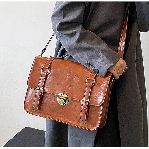Per donna Borsa a tracolla Borsa a tracolla pelle sintetica Esterno Ufficio Regolabile Massima capacità Traspirante Tinta unica colore caramello Nero Kaki
Per donna Borsa a tracolla Borsa a tracolla pelle sintetica Esterno Ufficio Regolabile Massima capacità Traspirante Tinta unica colore caramello Nero Kaki
