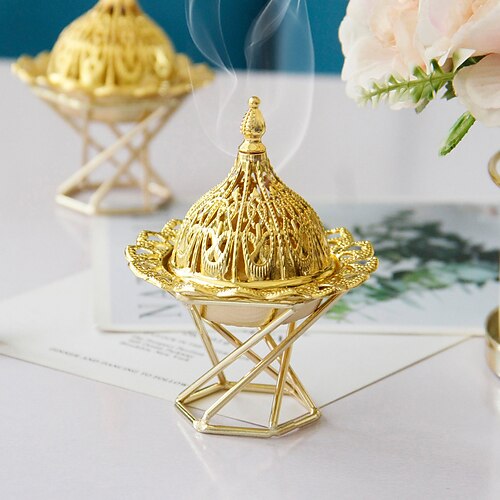 Ramadan festival medio oriente arabo oro metallo bruciatore di incenso mini piccolo bruciatore di incenso portatile decorazione della casa musulmano
Ramadan festival medio oriente arabo oro metallo bruciatore di incenso mini piccolo bruciatore di incenso portatile decorazione della casa musulmano