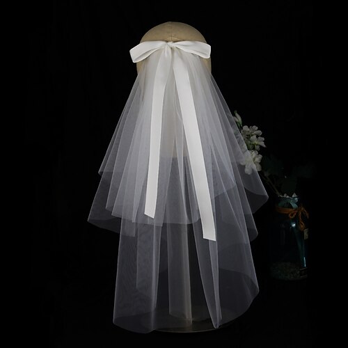2 strati stile sveglio Veli da sposa Velo corto (ai gomiti) con Fiocco in satin Tulle
2 strati stile sveglio Veli da sposa Velo corto (ai gomiti) con Fiocco in satin Tulle