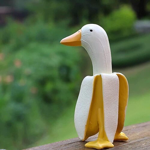 Pato de banana decorações criativas estátuas de pato inventivas ornamento de mesa de escritório em casa decoração de varanda de jardim para pátio ao ar livre gramado
Pato de banana decorações criativas estátuas de pato inventivas ornamento de mesa de escritório em casa decoração de varanda de jardim para pátio ao ar livre gramado