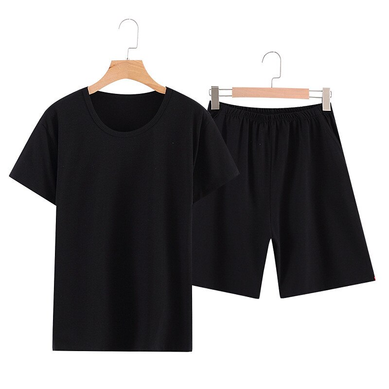 Herr Vardagsklädsel Sovkläder Pyjamas set Pyjamastopp och shorts 1set Ren färg Mode Mjukt Hem Säng Bomull Lättvikt Rund hals Kortärmad Shorts Grundläggande Höst Vår Svart Marinblå 2025 - $21.99 –P1