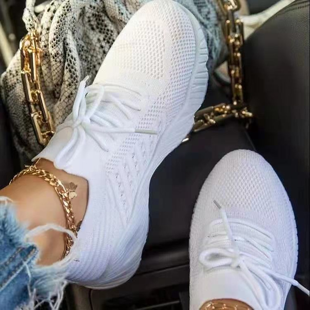 White trainers on sale with black heel