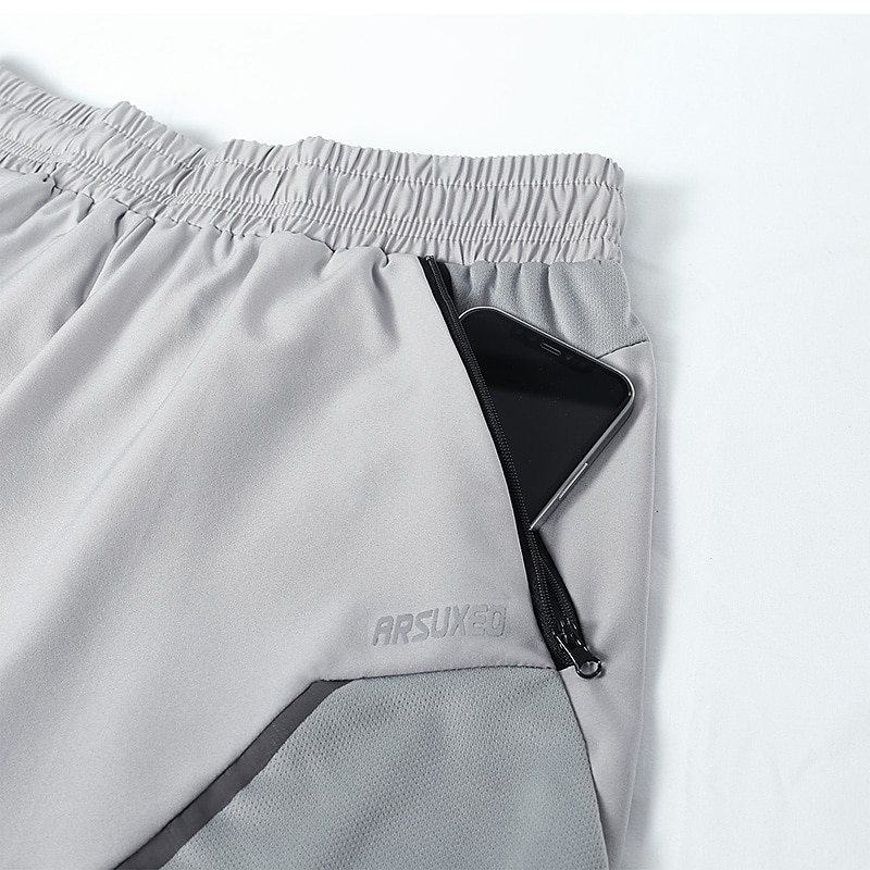 Homme Bloc de Couleur Shorts de course Combi Short Cuissard Short Sport Vélo Shorts Coupe décontractée Des sports Séchage Rapide Doux Bandes réfléchissantes Évacuation de la transpiration Noir Rouge de 2026 ? $26.99 –P13