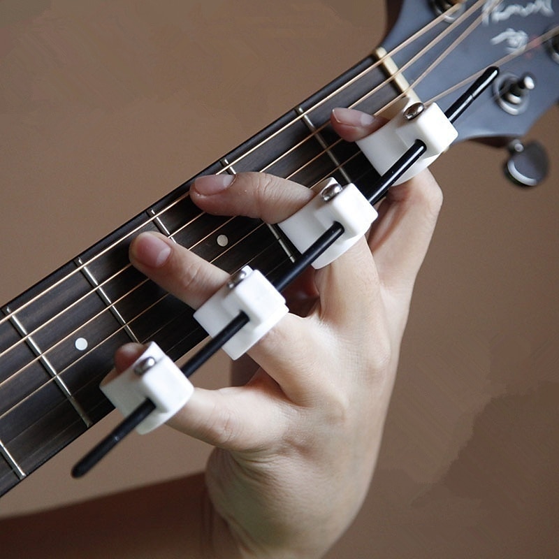 állítható távolságú ujjnyújtó gitár oktató kezdőknek ujjnyújtó ujjnyújtó tréner ujjerős tréner zongoratanulóknak szaxofon tanuló ukulele kezdőknek 2025 - $7.99 –P1