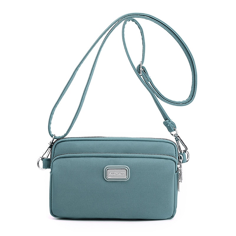 Dam Crossbody-väska Axelväska Hoboväska Nylon Utomhus Dagligen Helgdag Dragkedja Stor kapacitet Vattentät Lättvikt Ensfärgat Ljus och elegant lila Svart Marinblå 2025 - $14.99 –P11