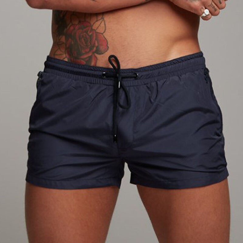Bărbați Pantaloni scurti de atletism Pantaloni scurți de antrenament Pantaloni scurți de alergare Pantaloni Sport de Sală Buzunar Cordon cu căptușeală din plasă Culoare solidă Respirabil Uscare rapidă 2025 - $12.99 –P9