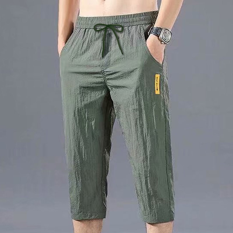 Homens calções atléticos Calças Cropped Shorts casuais Calças Capri Bolsos Com Cordão Cintura elástica Tecido Conforto Secagem Rápida Ao ar livre Diário Para Noite Moda Roupa de rua Preto Verde de 2025 por $10.49 –P2