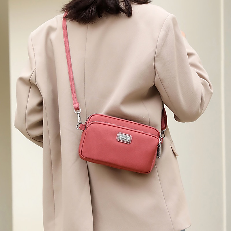 Dam Crossbody-väska Axelväska Hoboväska Nylon Utomhus Dagligen Helgdag Dragkedja Stor kapacitet Vattentät Lättvikt Ensfärgat Ljus och elegant lila Svart Marinblå 2025 - $14.99 –P1