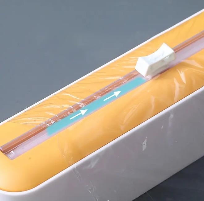 2 i 1 plastfolie dispenser matfilm dispenser cutter saran wrap dispenser aluminiumsfolie pergament papir injektor kjøkkenverktøy 2025 - $9.99 -P3