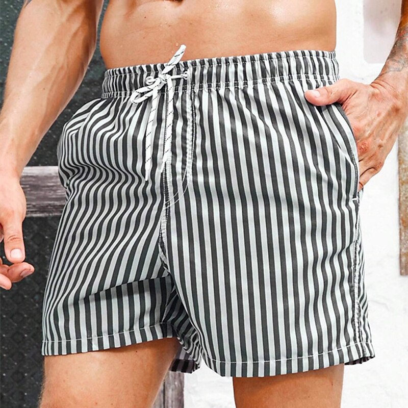 Herren Boardshorts Badeshorts Bademode Ausgehen Wochenende Atmungsaktiv Schnelltrocknend Tasche Kordelzug Elastische Taille Gestreift Kurz Gymnastik Brautkleider schlicht Sportkleidung Himmelblau 2025 - $15.49 –P7