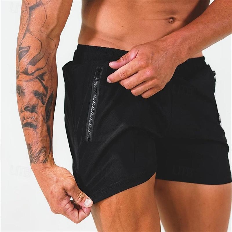 Per uomo Pantaloncini da sudore Pantaloncini Pantaloncini casual Cerniera A cordoncino Vita elastica Liscio Comfort Breve Per eventi Spiaggia Fine settimana Di tendenza Informale Nero Bianco Media del 2025 a $16.49 –P12