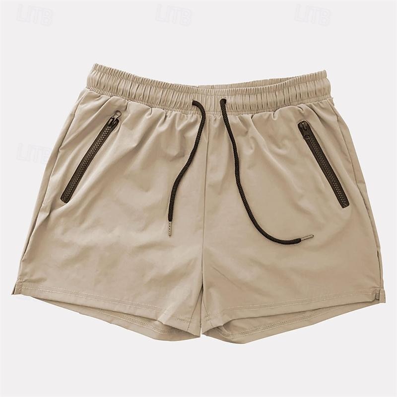 Per uomo Pantaloncini da sudore Pantaloncini Pantaloncini casual Cerniera A cordoncino Vita elastica Liscio Comfort Breve Per eventi Spiaggia Fine settimana Di tendenza Informale Nero Bianco Media del 2025 a $16.49 –P15