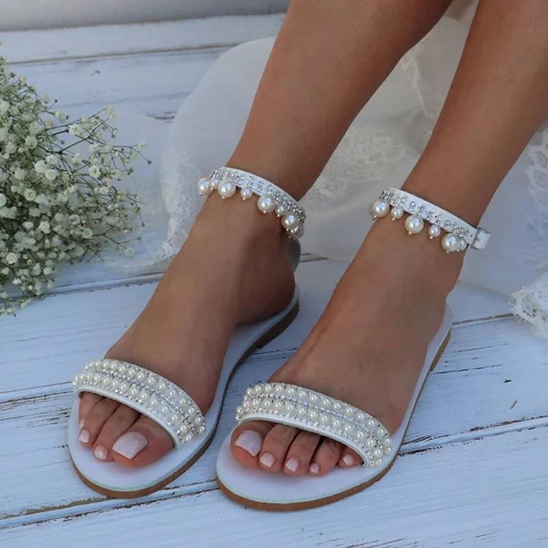 Női Esküvői cipők Bling Bling cipők Csillogó cipő Csillogó szandálok Menyasszonyi cipők Strasszkő Hamis gyöngy Lapos Lábujj nélküli Műbőr Bokapánt Fehér 2025 - $59.99 –P1