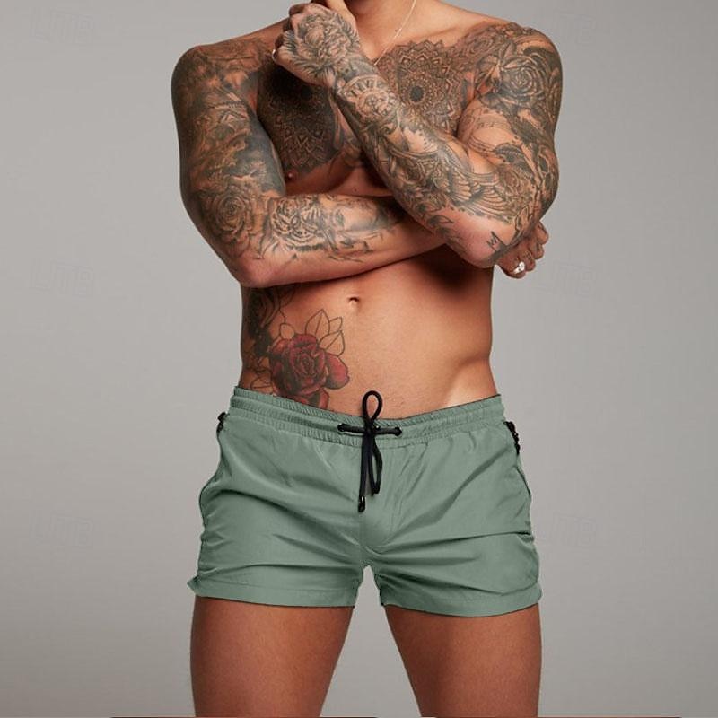 Bărbați Pantaloni scurti de atletism Pantaloni scurți de antrenament Pantaloni scurți de alergare Pantaloni Sport de Sală Buzunar Cordon cu căptușeală din plasă Culoare solidă Respirabil Uscare rapidă 2025 - $12.99 –P4