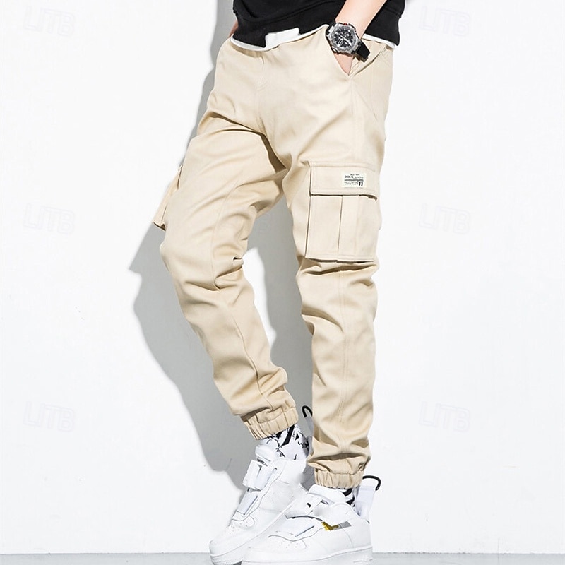 Homme Pantalon Cargo Pantalon Jogger Pantalon Cordon Taille elastique Multi poche Plein Vestimentaire Extérieur du quotidien Camping et randonnée Mode Classique Noir Vert Véronèse de 2026 ? $20.99 –P15