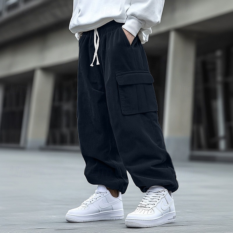 Homme Pantalon Cargo Pantalon en Velours Côtelé Pantalon Pantalon baggy Cordon Taille elastique Multi poche Couleur unie Respirable Doux Toute la longueur Formel Bureau Travail mode simple Ample Noir de 2025 ? $27.99 –P1