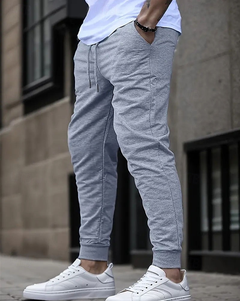 Pánské Atletické kalhoty Tepláky Běžec Kalhoty Kapsy Šňůrky Elastický pas Bez vzoru Pohodlné Outdoorové sporty Denní Módní Na běžné nošení Černá Námořnická modř Lehce elastické 2025 - $12.99 –P1