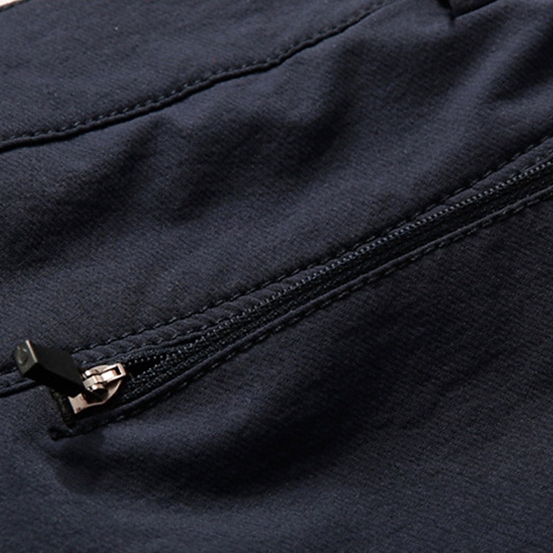 Hombre Pantalones al aire libre Pantalones para senderismo Pantalones tácticos Militar Al aire libre Ajuste regular Impermeable Transpirable Secado rápido Pantalones / Sobrepantalón Negro Azul Marino 2025 - $44.99 –P10