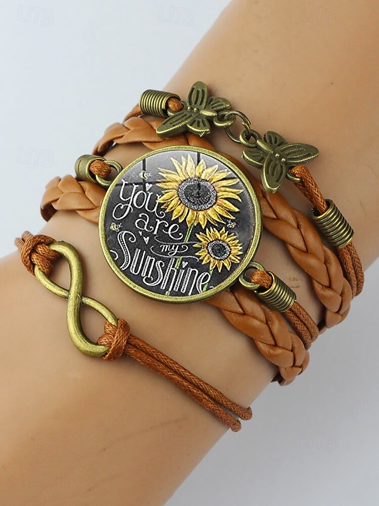 Bracelet en similicuir avec breloque tournesol et motif tressé et citation inspirante – bijoux de style bohème pour femmes, parfaits pour les cadeaux et les tenues décontractées de 2025 ? $7.99 –P1