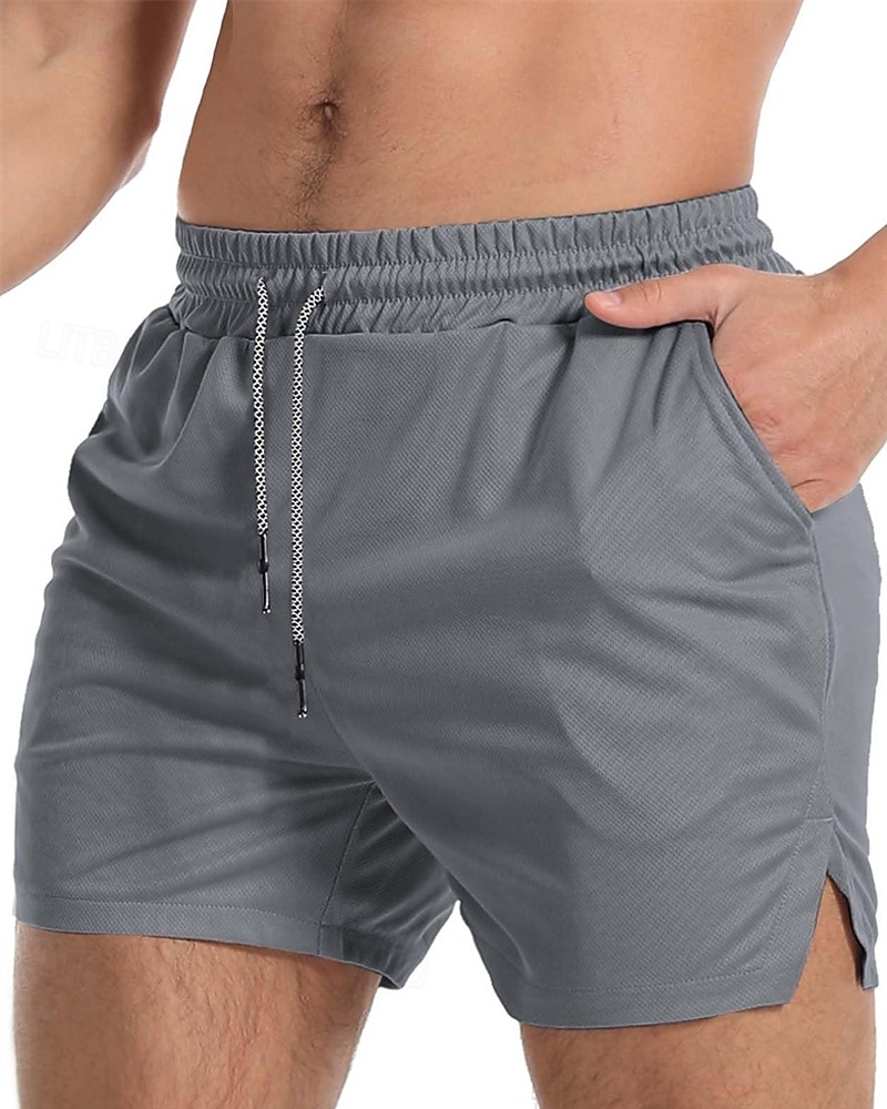Per uomo Pantaloncini attivi Pantaloncini da sudore Pantaloncini Pantaloncini estivi Tasche A cordoncino Vita elastica Liscio Comfort Breve Sportivo Giornaliero Per uscire Di tendenza Informale Verde del 2026 a $14.99 –P3