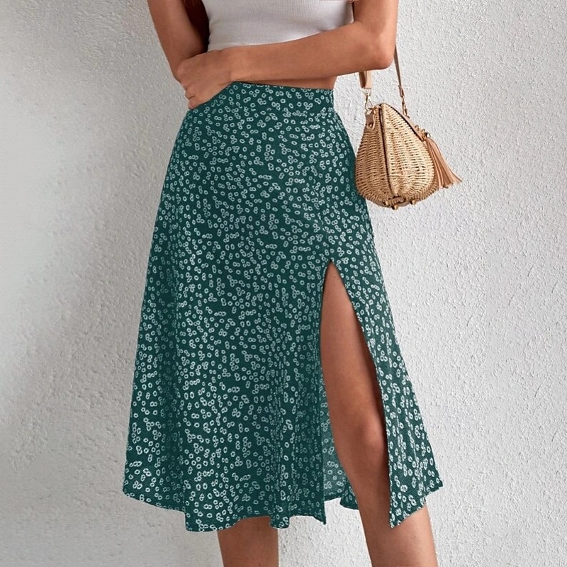 Dame الالتفاف A-linje Fritid Knelang Mellomhøyt liv Skjørt Blomstret Trykt mønster Mikroelastisk Feriereise Gate Svart Gul Blå Oransje Sommer Polyester 2025 - $21.99 –P11