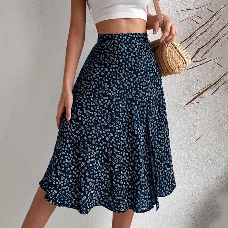 Dame الالتفاف A-linje Fritid Knelang Mellomhøyt liv Skjørt Blomstret Trykt mønster Mikroelastisk Feriereise Gate Svart Gul Blå Oransje Sommer Polyester 2025 - $21.99 –P18