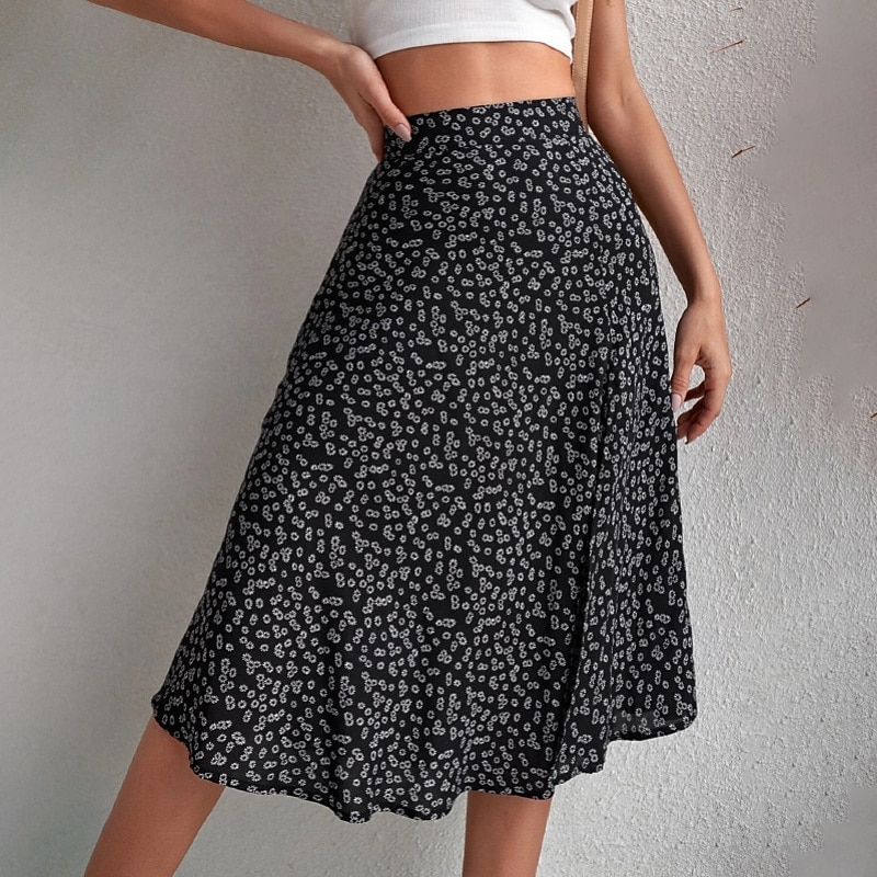 Dame الالتفاف A-linje Fritid Knelang Mellomhøyt liv Skjørt Blomstret Trykt mønster Mikroelastisk Feriereise Gate Svart Gul Blå Oransje Sommer Polyester 2025 - $21.99 –P6