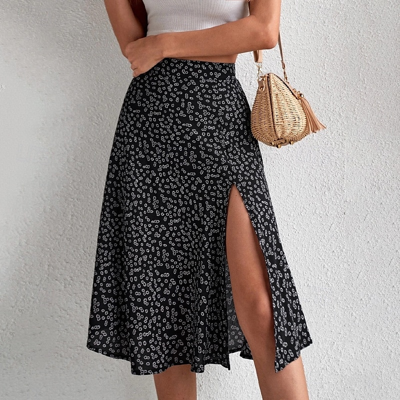 Dame الالتفاف A-linje Fritid Knelang Mellomhøyt liv Skjørt Blomstret Trykt mønster Mikroelastisk Feriereise Gate Svart Gul Blå Oransje Sommer Polyester 2025 - $21.99 –P5