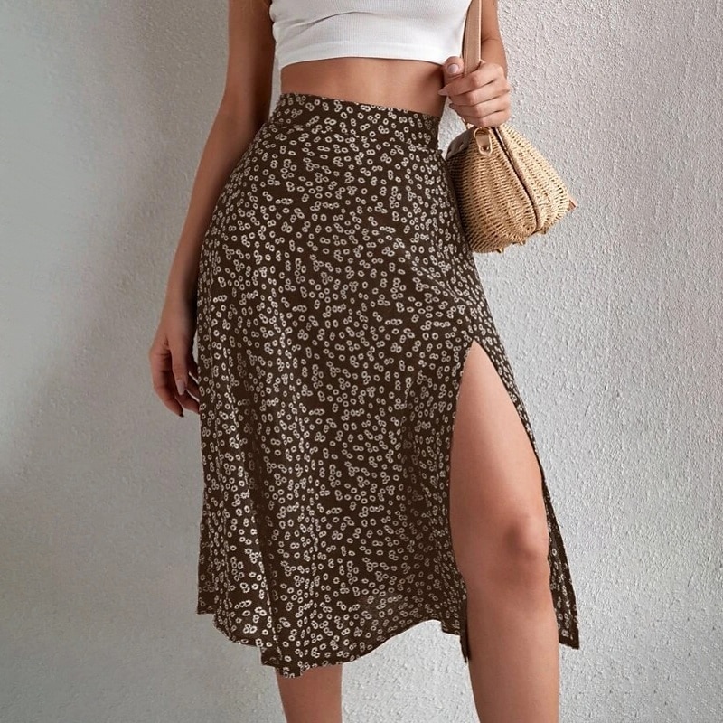 Dame الالتفاف A-linje Fritid Knelang Mellomhøyt liv Skjørt Blomstret Trykt mønster Mikroelastisk Feriereise Gate Svart Gul Blå Oransje Sommer Polyester 2025 - $21.99 –P15