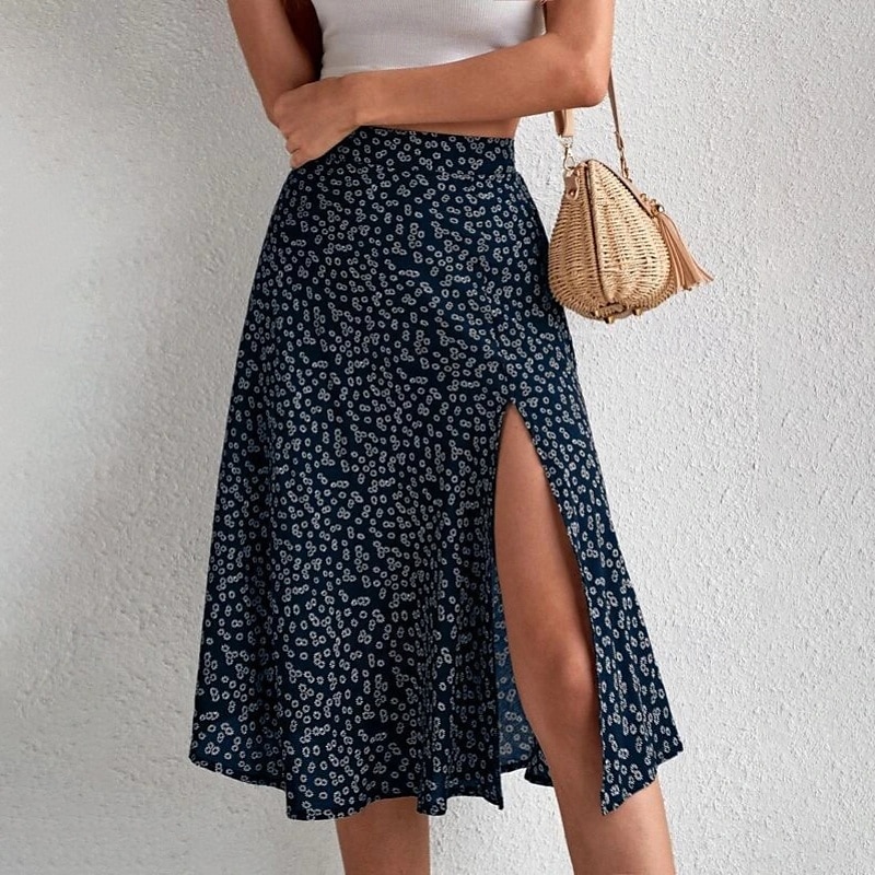 Dame الالتفاف A-linje Fritid Knelang Mellomhøyt liv Skjørt Blomstret Trykt mønster Mikroelastisk Feriereise Gate Svart Gul Blå Oransje Sommer Polyester 2025 - $21.99 –P17