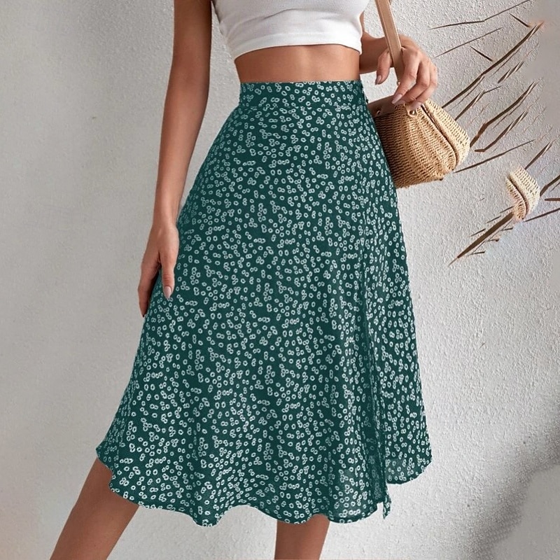 Dame الالتفاف A-linje Fritid Knelang Mellomhøyt liv Skjørt Blomstret Trykt mønster Mikroelastisk Feriereise Gate Svart Gul Blå Oransje Sommer Polyester 2025 - $21.99 –P13