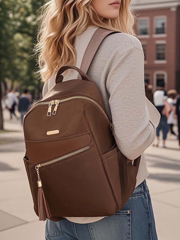 Sac à dos imperméable de grande capacité pour femme - peut être porté sur une épaule, détails de pompons élégants, fermeture à glissière, adapté au travail, à l'école et à un usage quotidien de 2025 ? $34.99 –P1