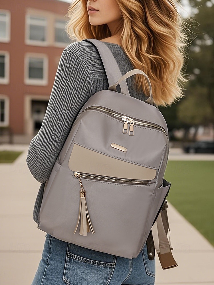 Sac à dos imperméable de grande capacité pour femme - peut être porté sur une épaule, détails de pompons élégants, fermeture à glissière, adapté au travail, à l'école et à un usage quotidien de 2025 ? $34.99 –P2