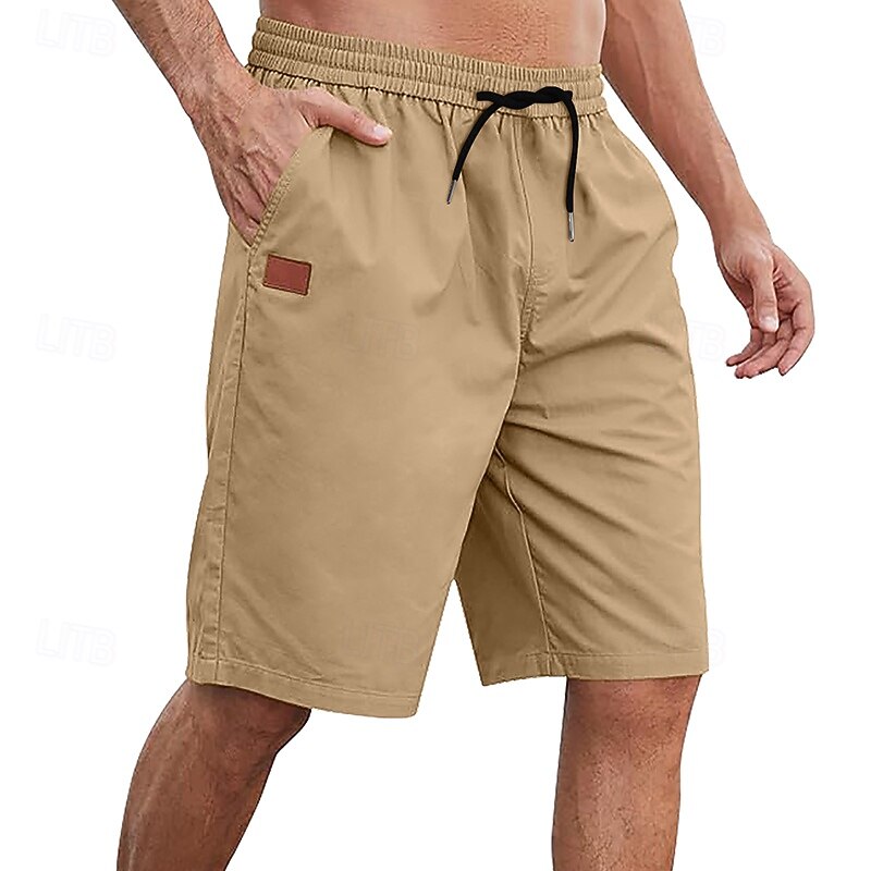 Homme Shorts cargo Shorts Shorts d'été Shorts de Travail Cordon de serrage Taille Élastique Uni Confort Portable Longueur Genou Quotidien Extérieur Sport Mode Occasionnel bleu marine de 2026 ? $20.99 –P1