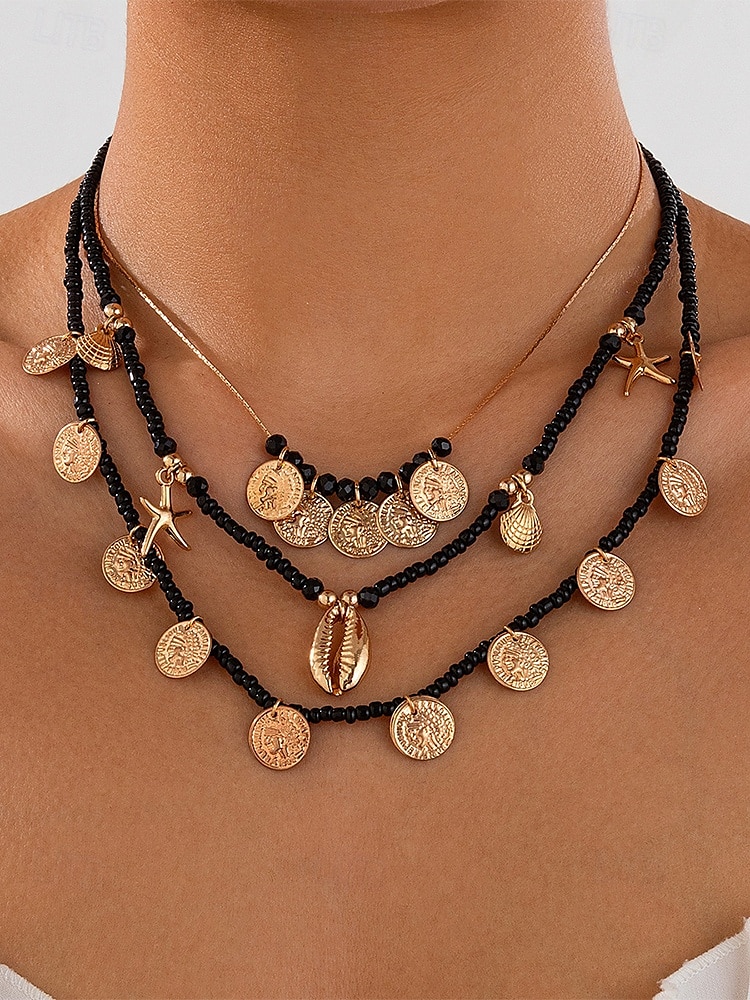 Ensemble de colliers à breloques coquillages et pièces de monnaie en perles dorées et bleues pour femmes – colliers superposés de style bohème de plage avec des accents d'étoiles de mer et de coquillages pour l'été et les vacances de 2025 ? $11.99 –P2