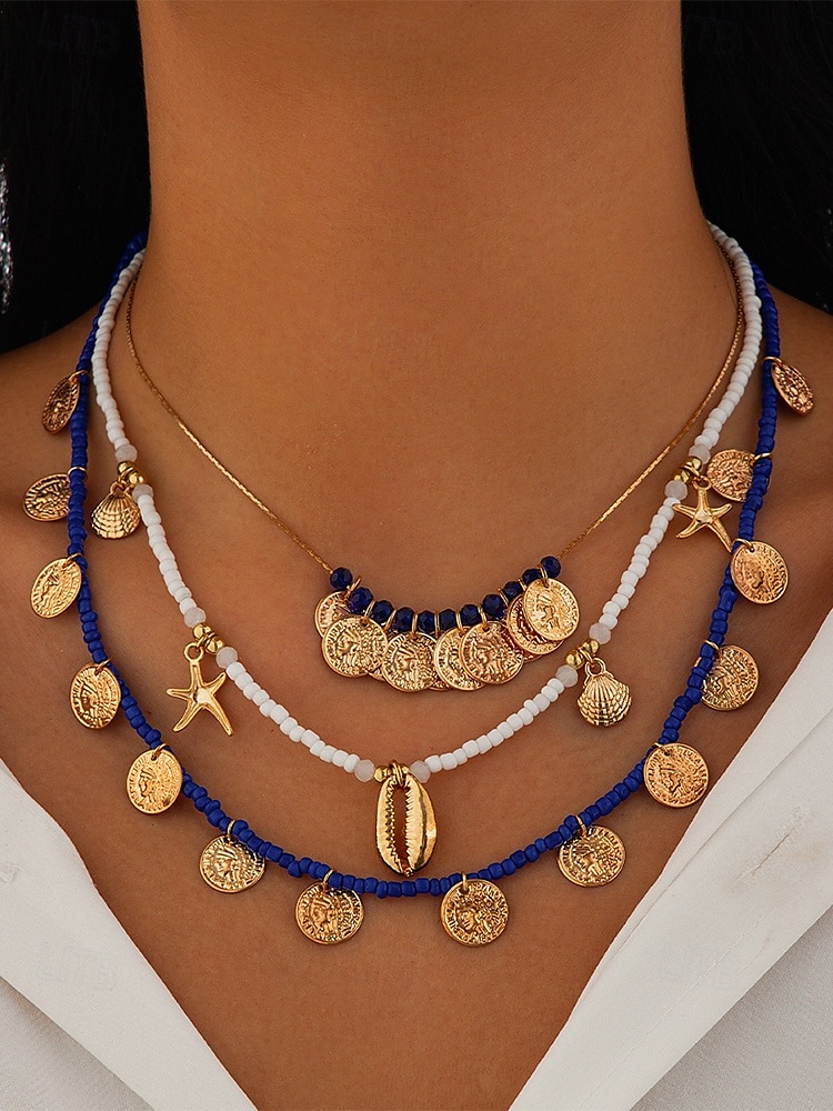 Ensemble de colliers à breloques coquillages et pièces de monnaie en perles dorées et bleues pour femmes – colliers superposés de style bohème de plage avec des accents d'étoiles de mer et de coquillages pour l'été et les vacances de 2025 ? $11.99 –P1