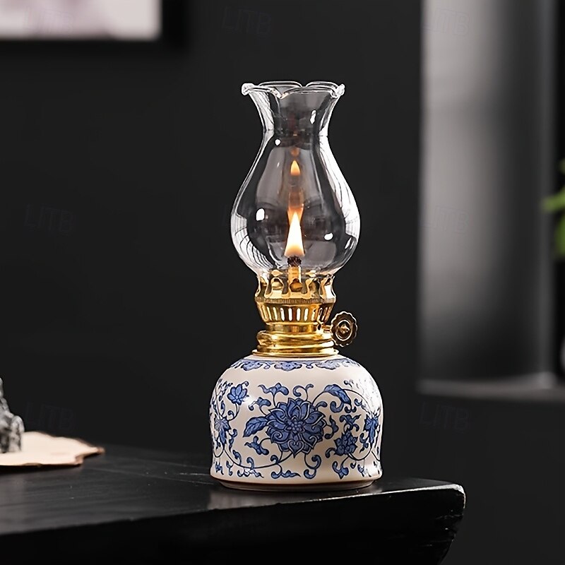una lampada a combustibile da campeggio regolabile per esterni, una lampada a olio per uso domestico, una lampada a olio floreale in ceramica blu e bianca per interni, una lampada a cherosene con del 2025 a $68.99 –P1
