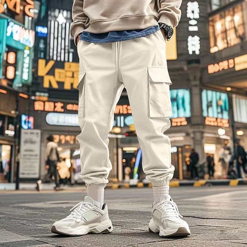 Homme Pantalons Cargo Pantalon Jogger Pantalons Cordon de serrage Taille Élastique Multi-poches Uni Portable Extérieur Quotidien Camping & Randonnée Mode Classique Noir Blanche de 2025 ? $24.99 –P16