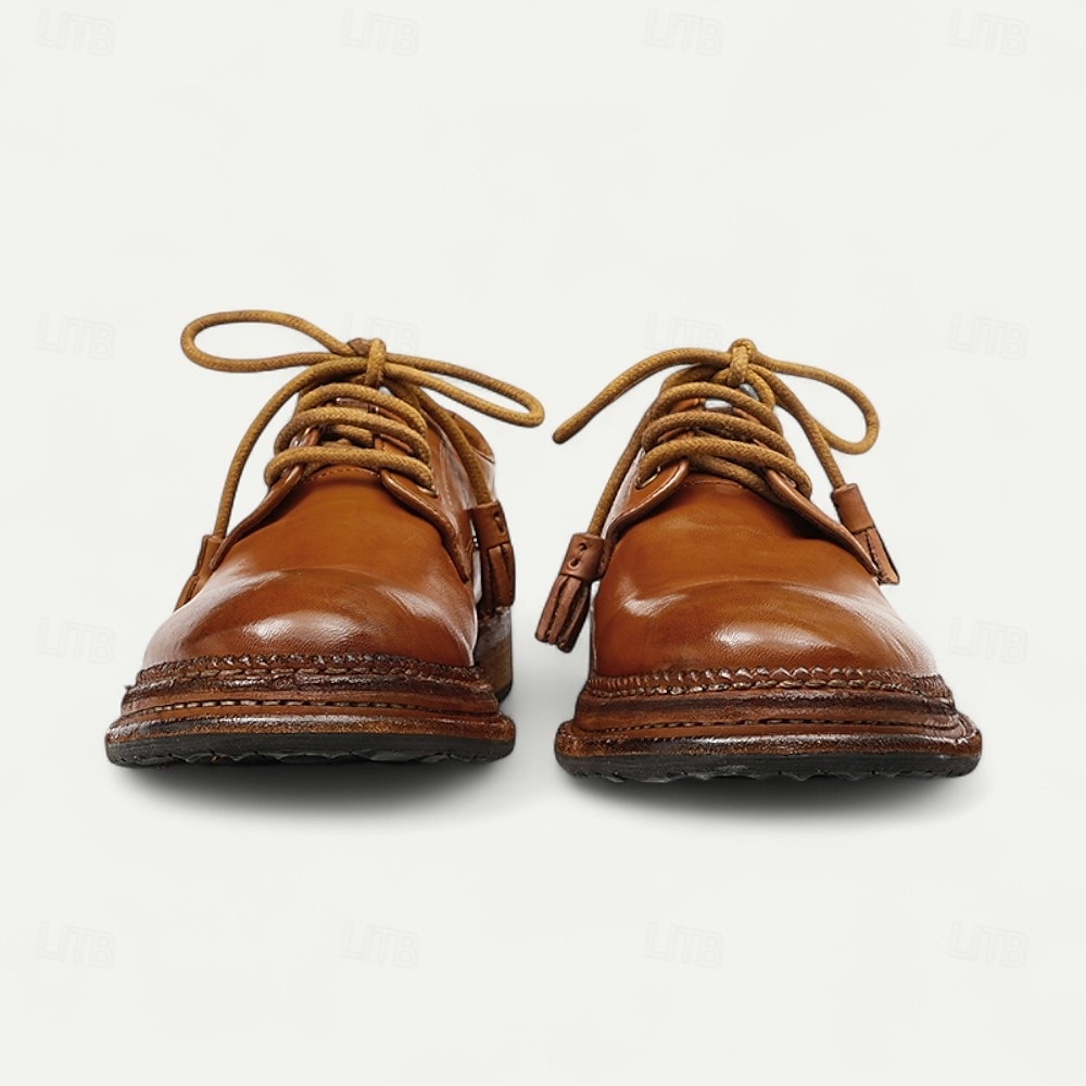 Herrloafers i brunt läder med mockasiner, tofsdetalj och Goodyear-randsydda detaljer – bekväma och eleganta skor för både vardagliga och semiformella tillfällen 2025 - $229.99 –P7