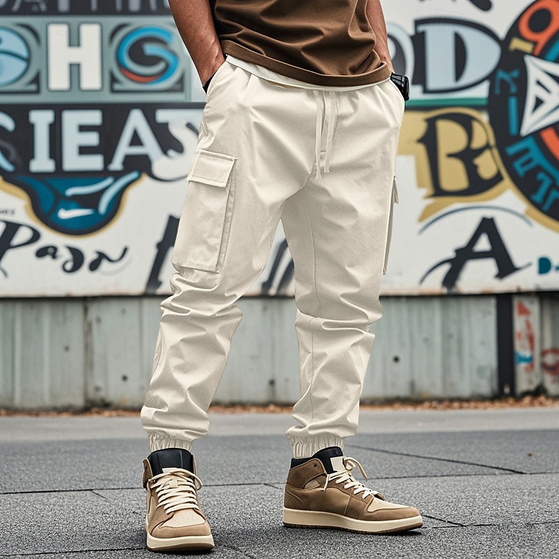 Homme Pantalons Cargo Pantalon Jogger Pantalons Cordon de serrage Taille Élastique Multi-poches Uni Portable Extérieur Quotidien Camping & Randonnée Mode Classique Noir Blanche de 2025 ? $24.99 –P18