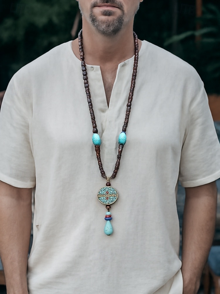 Collier pendentif en perles tribales pour homme – perles ethniques en bois faites à la main avec des accents turquoise, style bohème pour une tenue décontractée, de yoga, de méditation ou de festival de 2025 ? $11.99 –P1