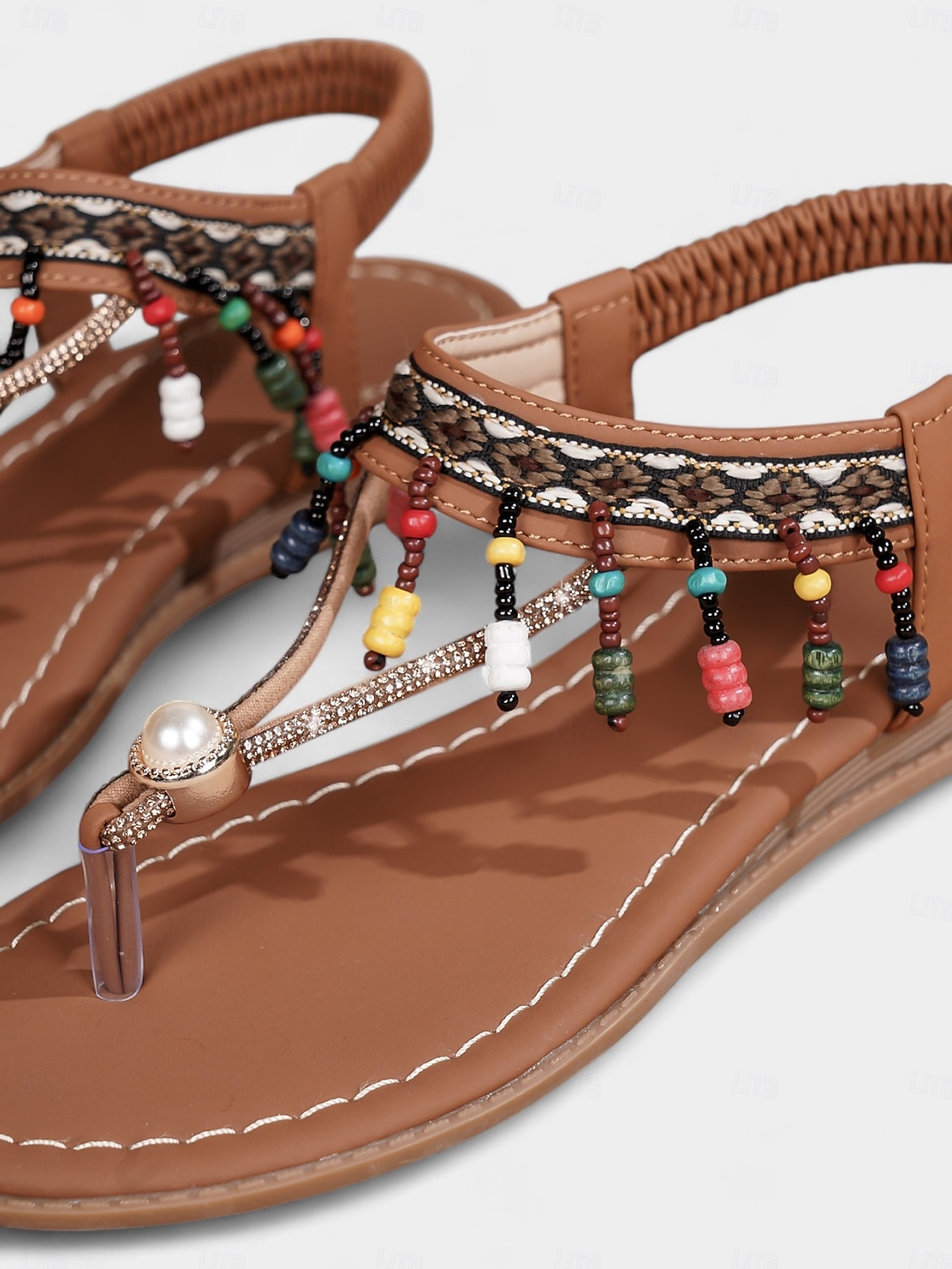 Damesandaler med bohemsk perlemønster og t-stropper i fargerikt materiale, flate sandaler med string for strandferier, sommerfestivaler og uformelle antrekk. 2025 - $26.99 –P4